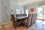 Beautiful Dining Area Table with Seating for 8-10 Guests, Natural Lighting and Open Floor Plan